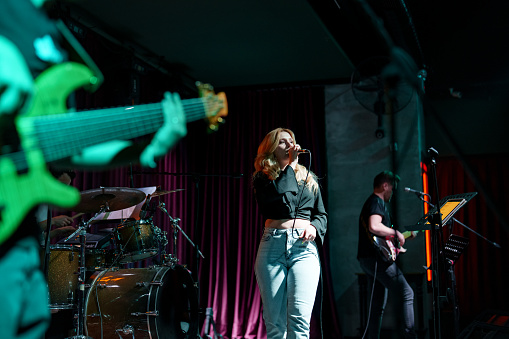 Musicians on stage performing