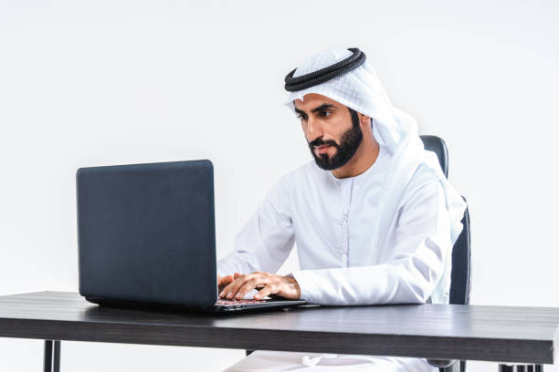 istock Emirate middle-eastern businessman wearing kandora working in the office, Dubai 1494371920