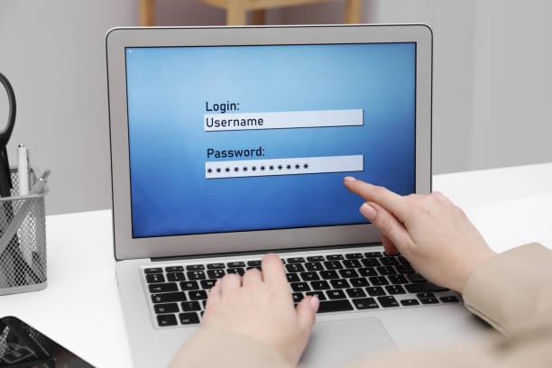 istock Woman unlocking laptop with blocked screen indoors, closeup 1494372437