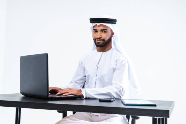 istock Emirate middle-eastern businessman wearing kandora working in the office, Dubai 1494372507
