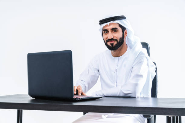 istock Emirate middle-eastern businessman wearing kandora working in the office, Dubai 1494372598