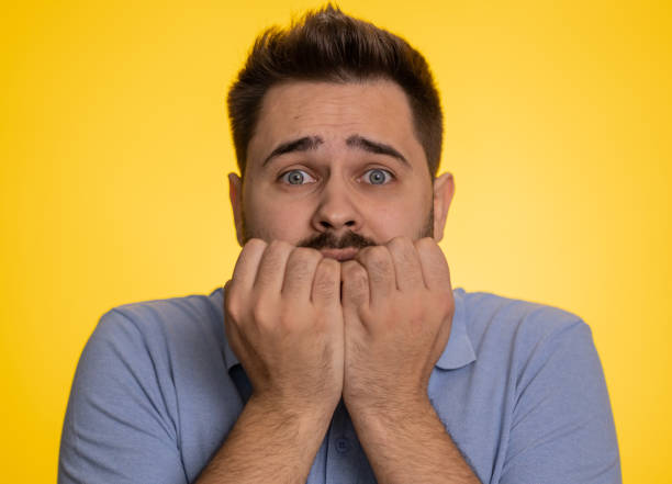 istock Caucasian man terrified about danger problems, suffering phobia, anxiety disorder, expresses fear 1494374576