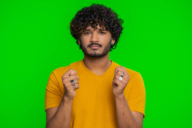 istock Quarrel, indian man showing fig negative gesture, rapacious, avaricious, acquisitive, refusal sign 1494374924