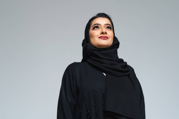 istock Beautiful arab middle-eastern woman with traditional abaya in studio 1494376694
