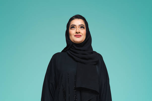 istock Beautiful arab middle-eastern woman with traditional abaya in studio 1494376881