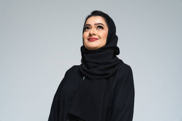istock Beautiful arab middle-eastern woman with traditional abaya in studio 1494377287