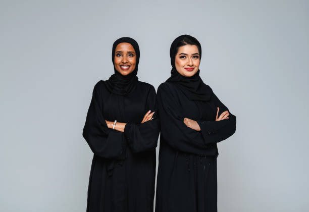 istock Beautiful arab middle-eastern women with traditional abaya in studio 1494377531