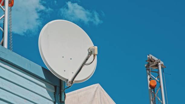 istock Satellite Internet and TV Signal Receiver Antenna Dish 1494377560