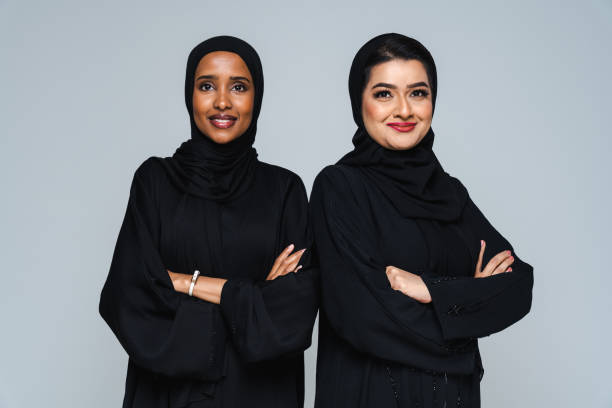 istock Beautiful arab middle-eastern women with traditional abaya in studio 1494377674