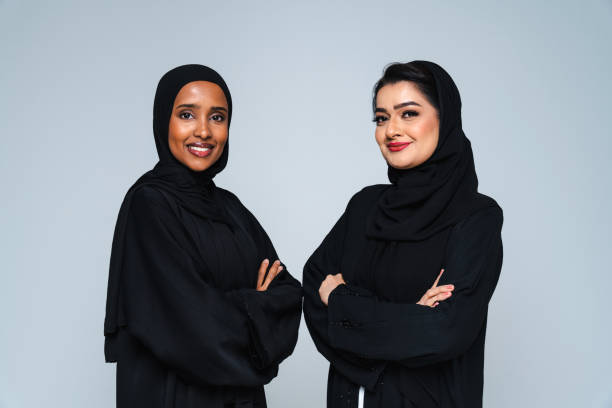istock Beautiful arab middle-eastern women with traditional abaya in studio 1494377789
