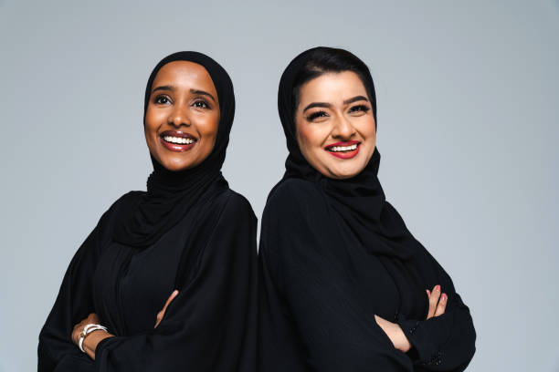 istock Beautiful arab middle-eastern women with traditional abaya in studio 1494379004