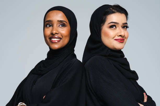 istock Beautiful arab middle-eastern women with traditional abaya in studio 1494379550