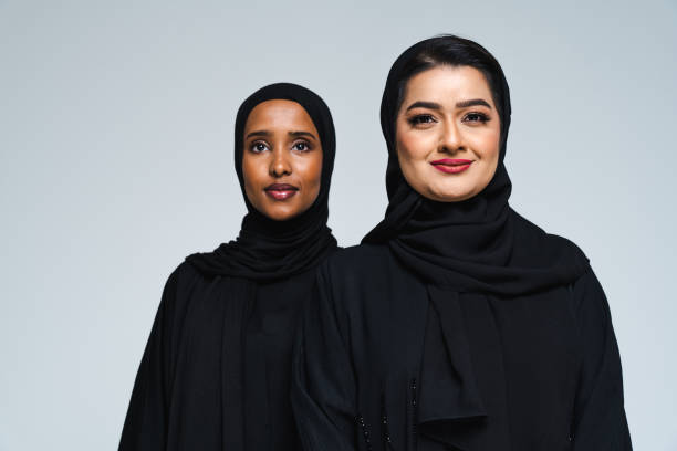 istock Beautiful arab middle-eastern women with traditional abaya in studio 1494379588