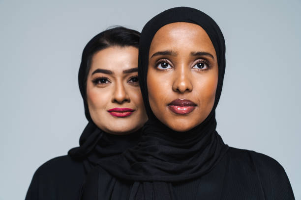 istock Beautiful arab middle-eastern women with traditional abaya in studio 1494379635