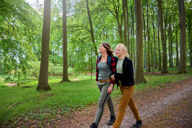 Enjoying forest nature. Walking away hiking