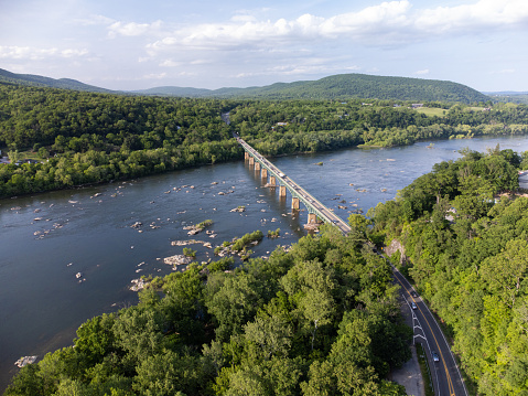 An aerial photo of the Harpers Bridge in Harpers Ferry which passes over the Potomac River.