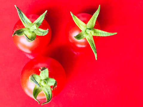 Fresh Tomatoes, Onion, Garlic and Parsley on white background