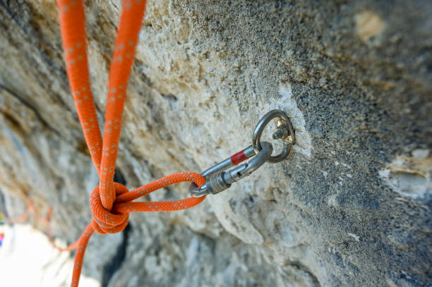 istock Rope and carabiner on rock 1494394905
