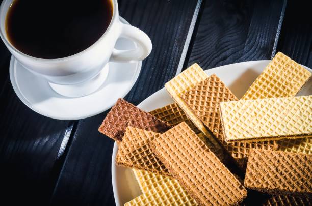 istock Coffee in a cup with cookies on a plate in the background. 1494396238