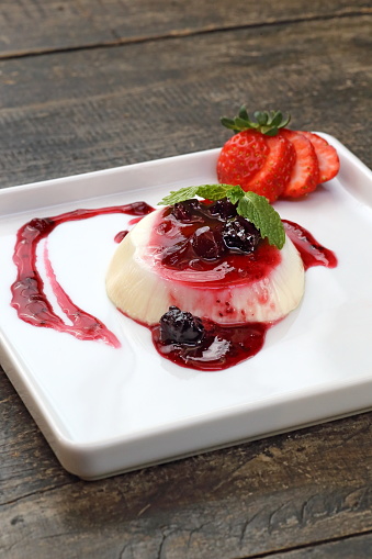 Panacotta with red fruit sauce
