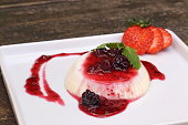 Panacotta with red fruit sauce