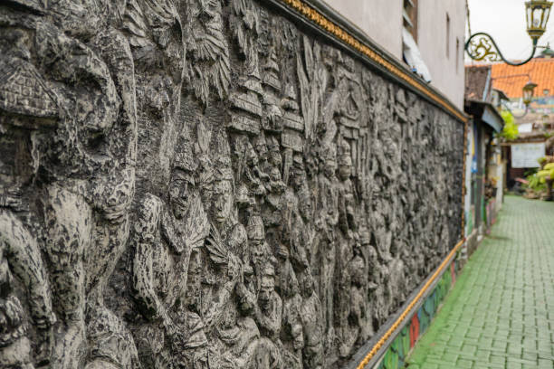 Texture and surface of batik carving on wall at Semarang.