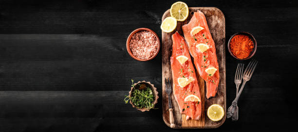 istock raw trout fillet red fish with lemon and spices ready for cooking 1494413465