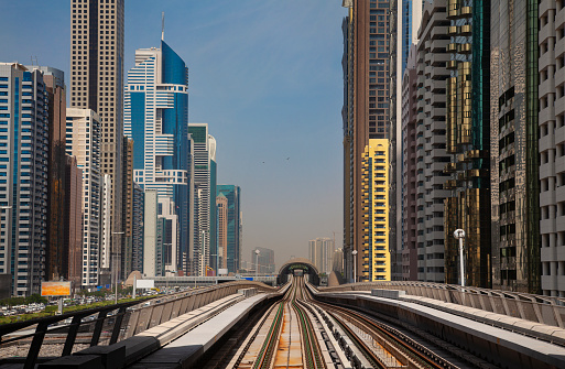 Modern skyscrapers along the metro line in Dubai, UAE