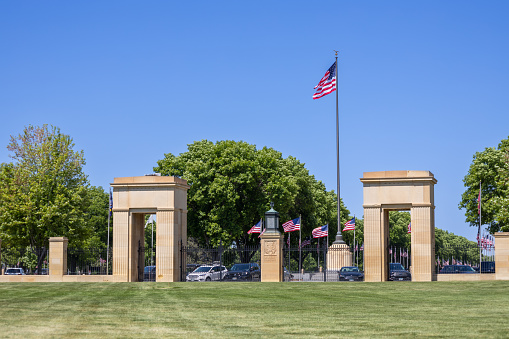 Minneapolis, Minnesota, USA - May 27, 2023: Landscape view of the entrance to Fort Snelling National Cemetery on a clear day.