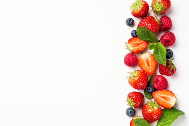 istock Strawberry, raspberry and blueberry on white background 1494421703