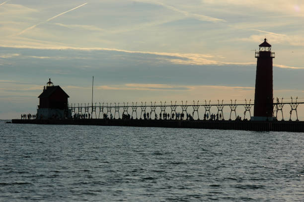 istock Grand Haven South Pier Lighthouses in Silhouette 1494435012