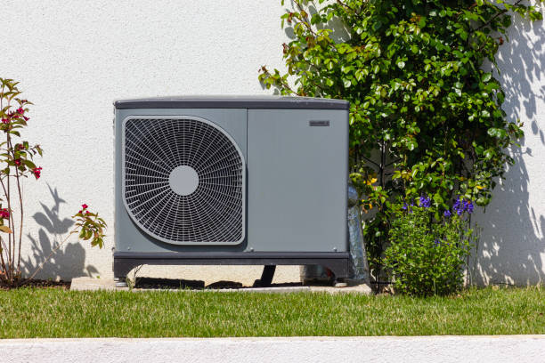 heat pump in a new building area with modern house facades stock photo