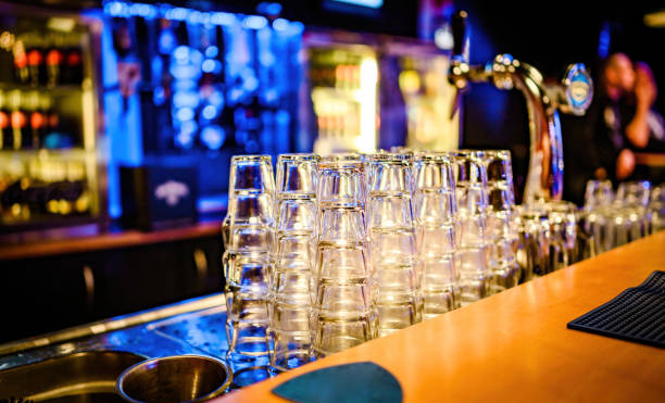 istock Stylish night bar counter with glasses 1494437987
