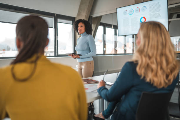 istock Female Black Manager Asking Team to Brainstorm Ideas 1494438838