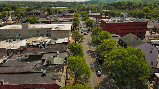 Cars and houses on Main Street of Downtown district in Stroudsburg, Monroe County in Pennsylvania. Aerial view