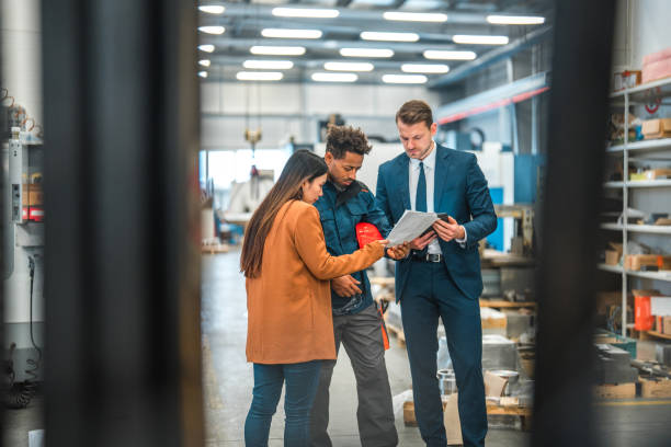 istock Handsome Multiracial Team Working In An Industrial Process 1494438922
