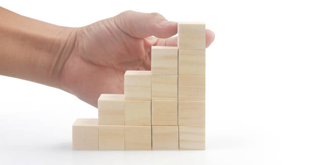 istock Wooden cubes in hand with copy space for input wording 1494440435
