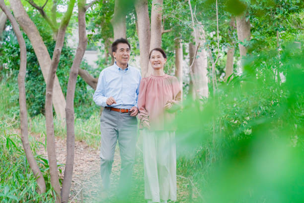 istock A senior couple taking a walk in nature 1494444123