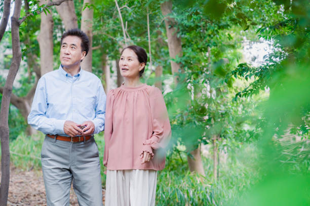 istock A senior couple taking a walk in nature 1494444138