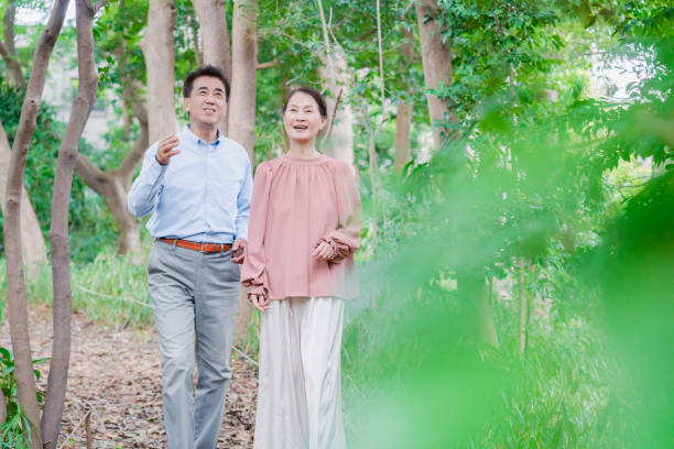 istock A senior couple taking a walk in nature 1494444146
