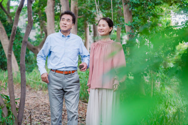 istock A senior couple taking a walk in nature 1494444151
