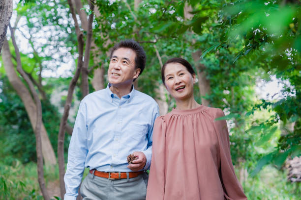 istock A senior couple taking a walk in nature 1494444154