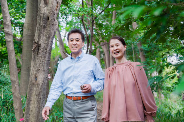 istock A senior couple taking a walk in nature 1494444171