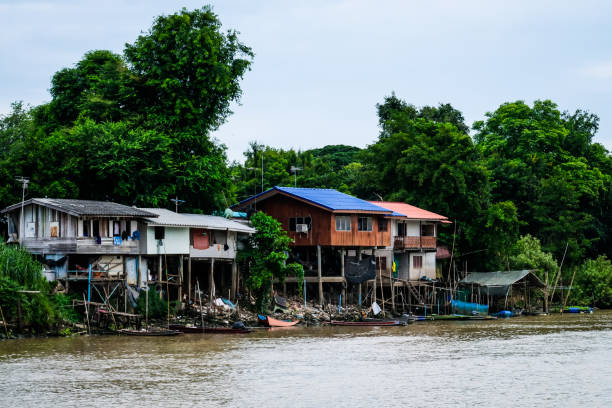 istock Old houses on stilts located River. 1494444297