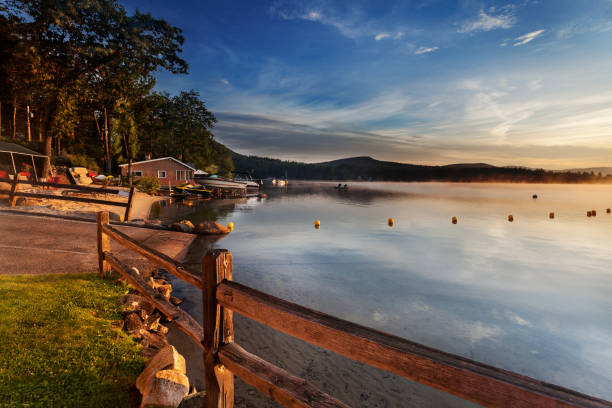 istock Boat ramp into lake at sunrise 1494449900