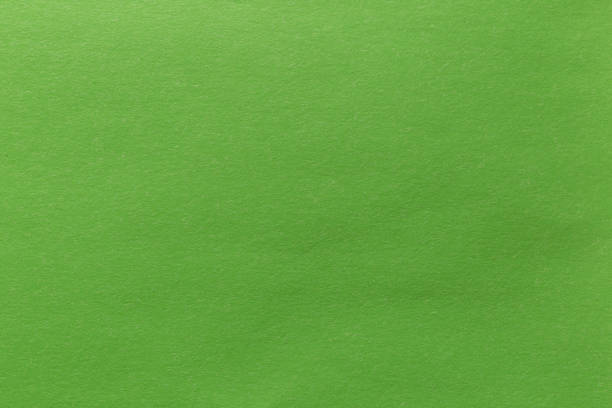 istock Green paper sheet texture cardboard background. 1494454973