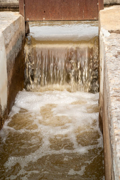 istock Vertical image of an agricultural irrigation ditch. 1494459462
