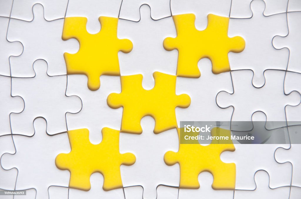 Top view of missing jigsaw puzzle with customizable space for text. Copy space with yellow background Top view of missing jigsaw puzzle with customizable space for text. Copy space with yellow background. Adaptation - Concept Stock Photo