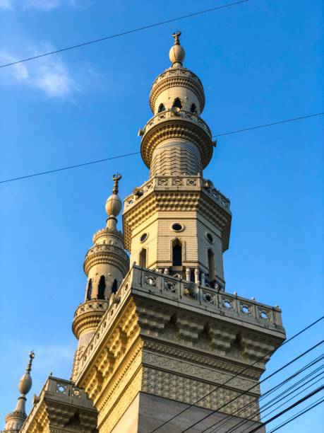 istock Mosque dome with blue sky and messy wires 1494465276