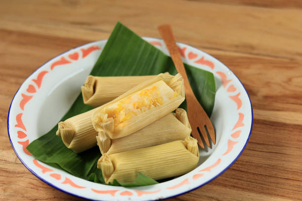 istock Lepet jagung, Steamed Corn, Flour, and Grated Coconut Wrapped with Corn Leaf 1494471189